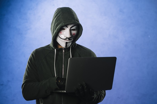 hacker-with-anonymous-mask (1) hacker-with-anonymous-mask (1)